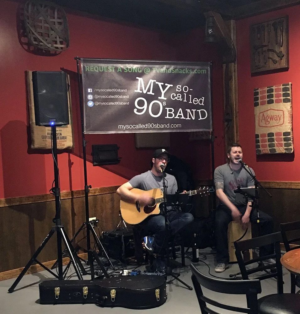 Acoustic duo on a small stage